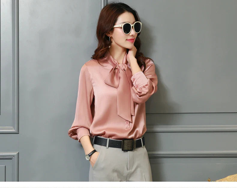 Tops Women's Casual Chiffon Blouse V-Neck Solid Shirt Bow Lantern SleeSPECIFICATIONSBrand Name: SURWENYUEStyle: Office LadyElasticity: Non StrechOrigin: Mainland ChinaCN: GuangdongSeason: All seasonFabric Type: ChiffonHign-concerned ChDMEwomenstorenull