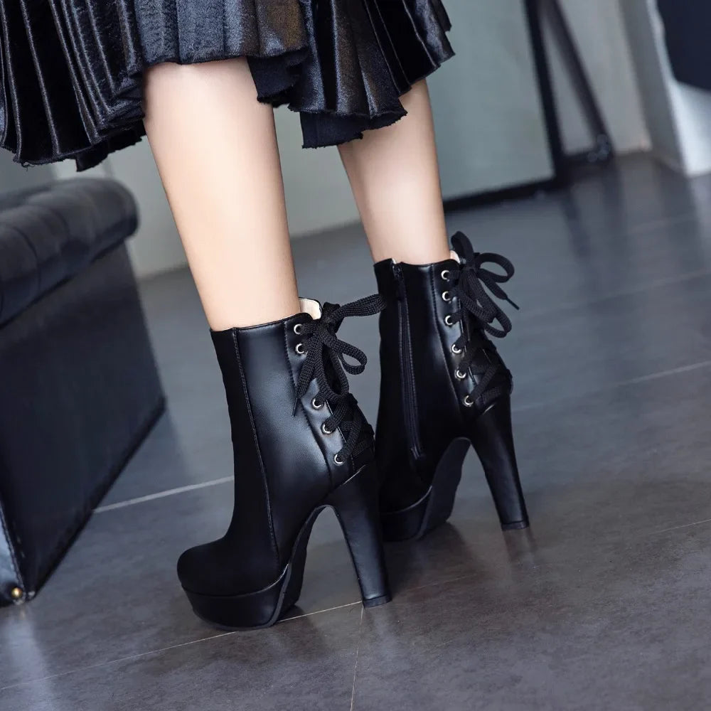 Fashion Ankle Boots Women Platform High Heels Short Boot Lace-up BlackSPECIFICATIONSBrand Name: ZOGEERBoot Type: basicShaft Material: PUOutsole Material: RUBBERUpper Material: PUHign-concerned Chemical: NoneOrigin: Mainland ChinaCN: SiDMEwomenstorenull