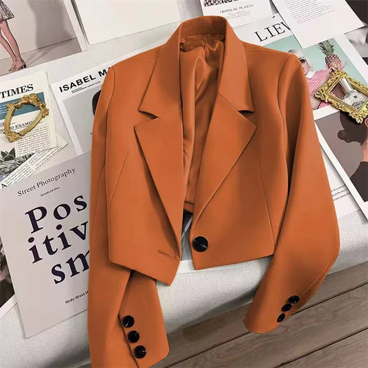 Women's loose short suit jacket with notched collar and single button closure, solid color design.