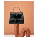 Luxury Crocodile Pattern Lady Handbag Women Shoulder Bags Designer FamSPECIFICATIONSBrand Name: NoEnName_NullOrigin: Mainland ChinaCN: ZhejiangLining Material: POLYESTERMain Material: Genuine leatherPlace Of Origin: ZHE JIANG ProvincePDMEwomenstorenull