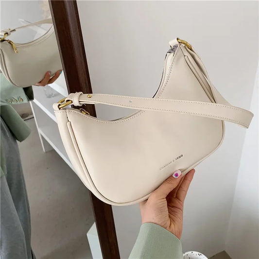 Underarm Bag for Women's Summer New Trendy and High end Crossbody Bag SPECIFICATIONSBrand Name: NoEnName_NullHign-concerned Chemical: NoneHandbags Type: Shoulder BagsMain Material: PULining Material: POLYESTERShape: BaguettePlace Of OrDMEwomenstorenull