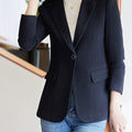 Elegant long-sleeve women's blazer with turn-down collar and single-button closure