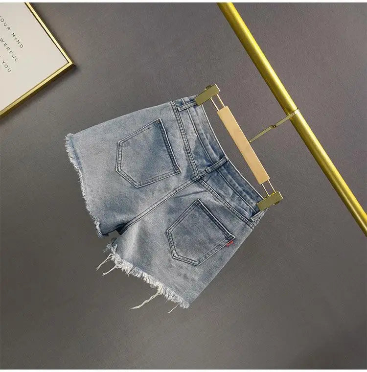 Denim Shorts Retro Slim Ragged Hot Pants Female Short JeansSPECIFICATIONSBrand Name: VWBQNZDecoration: ButtonDecoration: HOLEDecoration: PocketsFabric Type: BroadclothHign-concerned Chemical: NonePant Style: regularPattern TDMEwomenstorenull