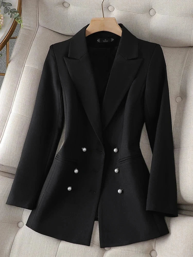 Women's black triple-breasted long sleeve blazer with notched collar.