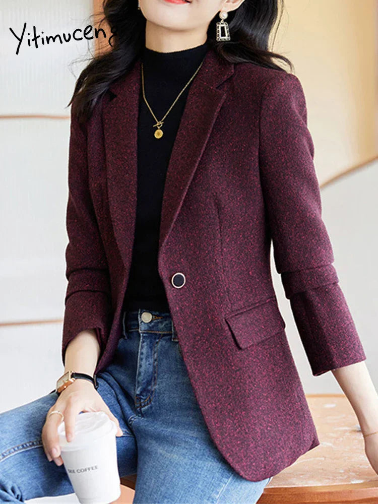 Elegant long-sleeve women's blazer with turn-down collar and single-button closure