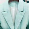 Gradient green women's slim-fitting suit set with notched collar blazer on hanger.