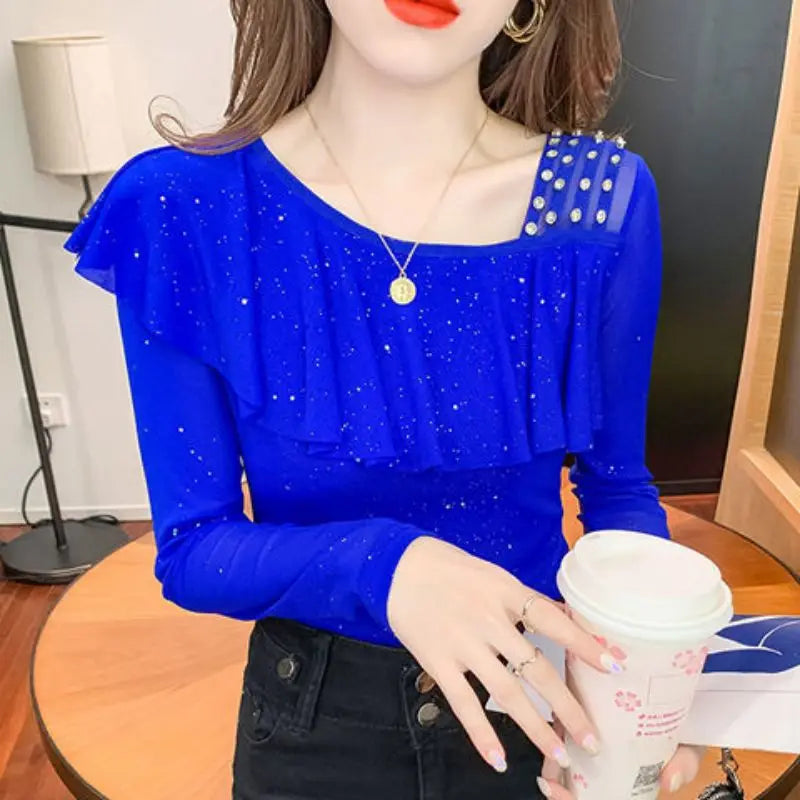 Sweet Skew Collar Spliced Gauze Ruffles Beading Blouse Female ClothingSPECIFICATIONSBrand Name: COZOKStyle: SweetElasticity: Slight StrechOrigin: Mainland ChinaSeason: Spring/SummerFabric Type: blendedMaterial: POLYESTERPattern Type: SDMEwomenstorenull