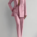 Women's two piece suit with long sleeve blazer and pencil pants in solid color.