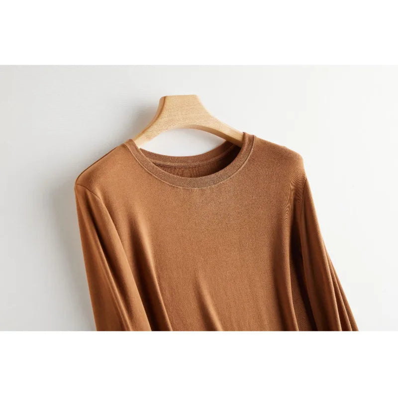 Wool Soft Long Sleeve T-shirts Women Round Neck Slim Fit Basic HeatingSPECIFICATIONSBrand Name: Y DemoStyle: Office LadyAge: MIDDLE AGEOrigin: Mainland ChinaCN: ZhejiangSeason: Autumn/WinterClothing Length: regularDecoration: noneElastDMEwomenstorenull