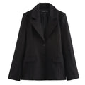 Elegant women's black blazer with a single button, slim lapel, long sleeves, and a regular fit design.