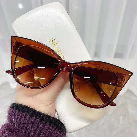 Sunglasses Woman Fashion Big Frame Cat Sun Glasses Female Retro ShadesSPECIFICATIONSDepartment Name: ADULTBrand Name: pwvxymItem Type: EYEWEARModel Number: SunglassesEyewear Type: SunglassesStyle: CAT EYEFrame Material: PolycarbonatePlDMEwomenstorenull