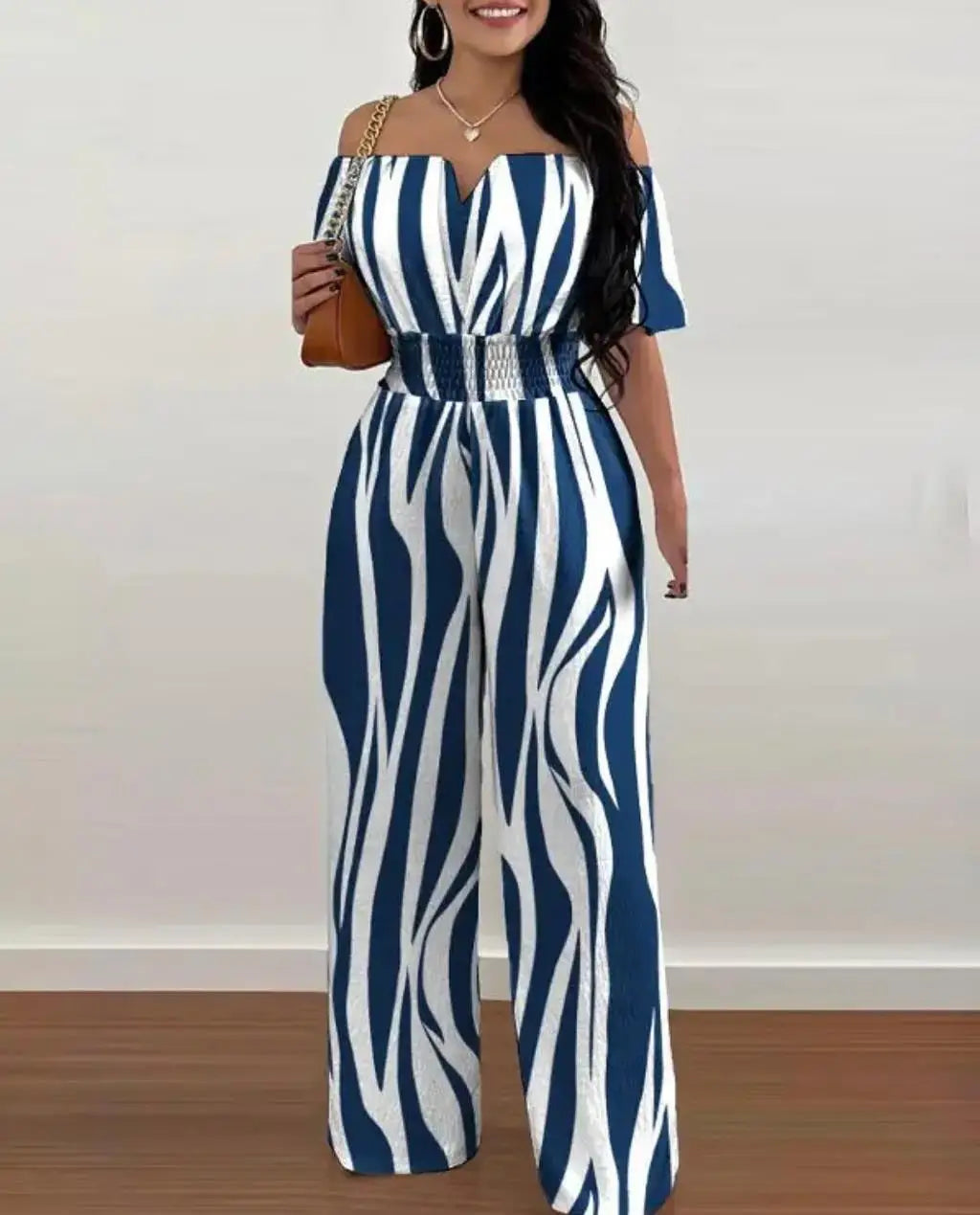 Fashion Printed Wide Leg Jumpsuit Women Sexy Slash Neck Off-shoulder HSPECIFICATIONSBrand Name: FUXIONGFUStyle: CasualAge: JUNIOROrigin: Mainland ChinaCN: GuangdongSeason: SummerMaterial: POLYESTERDecoration: noneFabric Type: POLYESTERDMEwomenstorenull