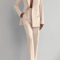 Two piece women's blazer suit with long sleeves and straight-fit pencil pants.