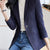 Elegant long-sleeve women's blazer with turn-down collar and single-button closure