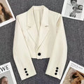 Women's loose short suit jacket with notched collar and button details, ideal for spring and fall fashion.