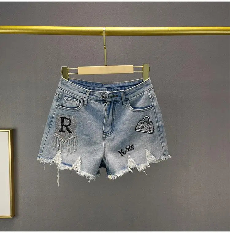 Denim Shorts Retro Slim Ragged Hot Pants Female Short JeansSPECIFICATIONSBrand Name: VWBQNZDecoration: ButtonDecoration: HOLEDecoration: PocketsFabric Type: BroadclothHign-concerned Chemical: NonePant Style: regularPattern TDMEwomenstorenull