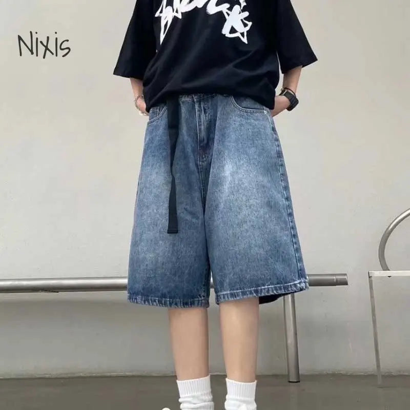 High Street Retro Blue Jeans Shorts Women Summer New Baggy Wide Leg DeSPECIFICATIONSBrand Name: NiXisMaterial: COTTONMaterial: POLYESTERElasticity: Non StrechFabric Type: Thin denimHign-concerned Chemical: NoneLength: Calf-Length PantsDMEwomenstorenull