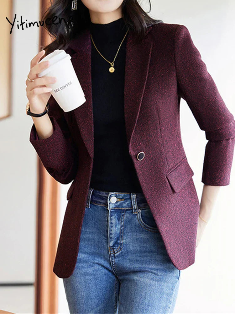 Elegant long-sleeve women's blazer with turn-down collar and single-button closure