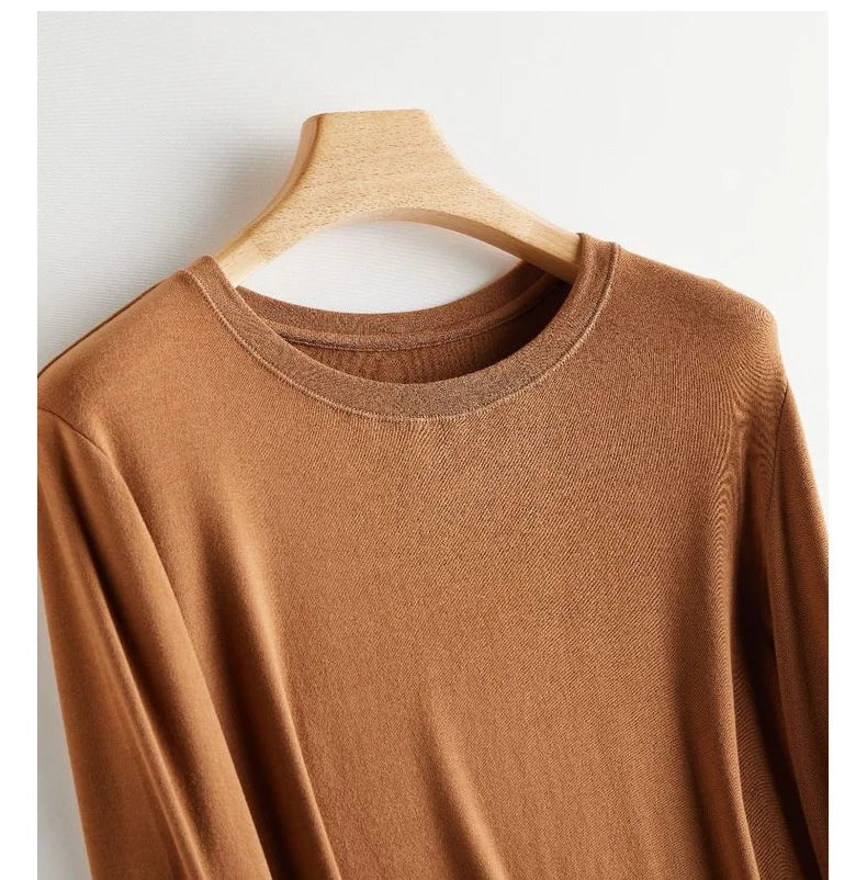 Wool Soft Long Sleeve T-shirts Women Round Neck Slim Fit Basic HeatingSPECIFICATIONSBrand Name: Y DemoStyle: Office LadyAge: MIDDLE AGEOrigin: Mainland ChinaCN: ZhejiangSeason: Autumn/WinterClothing Length: regularDecoration: noneElastDMEwomenstorenull