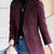 Elegant long-sleeve women's blazer with turn-down collar and single-button closure