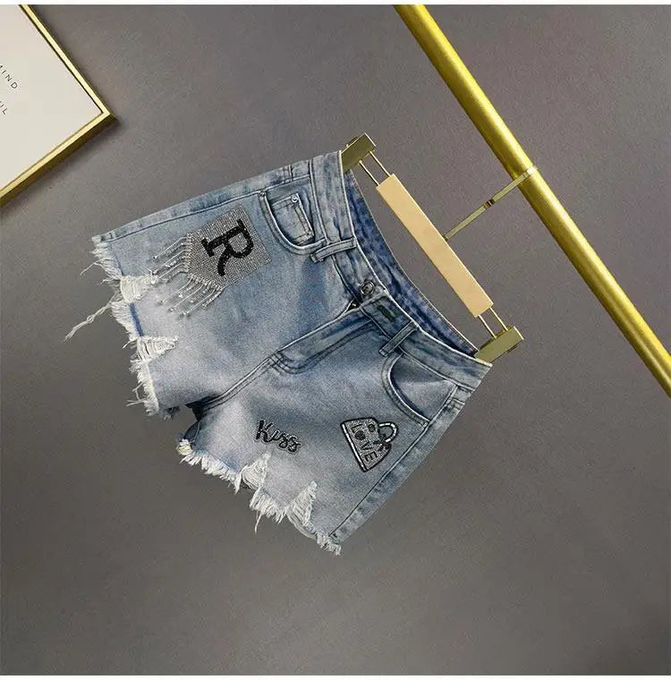 Denim Shorts Retro Slim Ragged Hot Pants Female Short JeansSPECIFICATIONSBrand Name: VWBQNZDecoration: ButtonDecoration: HOLEDecoration: PocketsFabric Type: BroadclothHign-concerned Chemical: NonePant Style: regularPattern TDMEwomenstorenull