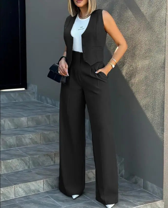 Women's casual slim notched blazer pant set in black, featuring a sleeveless blazer and high-waisted ankle-length pants.