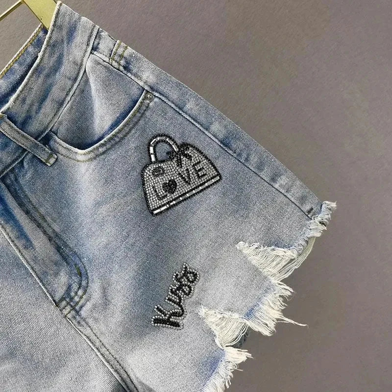 Denim Shorts Retro Slim Ragged Hot Pants Female Short JeansSPECIFICATIONSBrand Name: VWBQNZDecoration: ButtonDecoration: HOLEDecoration: PocketsFabric Type: BroadclothHign-concerned Chemical: NonePant Style: regularPattern TDMEwomenstorenull