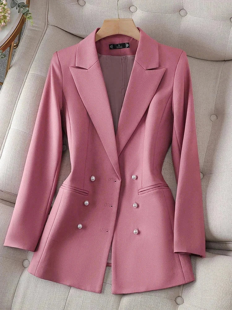 Triple-breasted pink blazer with notched collar and full sleeves.