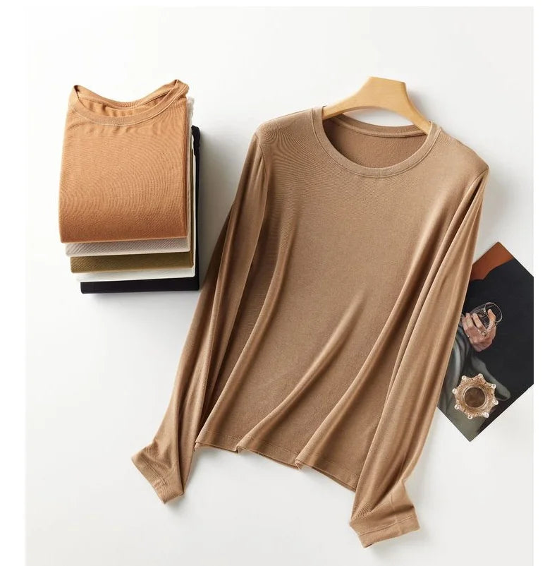 Wool Soft Long Sleeve T-shirts Women Round Neck Slim Fit Basic HeatingSPECIFICATIONSBrand Name: Y DemoStyle: Office LadyAge: MIDDLE AGEOrigin: Mainland ChinaCN: ZhejiangSeason: Autumn/WinterClothing Length: regularDecoration: noneElastDMEwomenstorenull