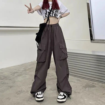 Cargo Pants Spring Elastic Waist Solid Color Pockets Wide Leg Trouser SPECIFICATIONSBrand Name: NoEnName_NullMaterial: POLYESTEROrigin: Mainland ChinaCN: JiangxiClosure Type: DrawstringGender: WOMENItem Type: full lengthSport Type: RunDMEwomenstorenull