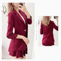 Women's elegant 2-piece blazer and A-line skirt suit in deep red.