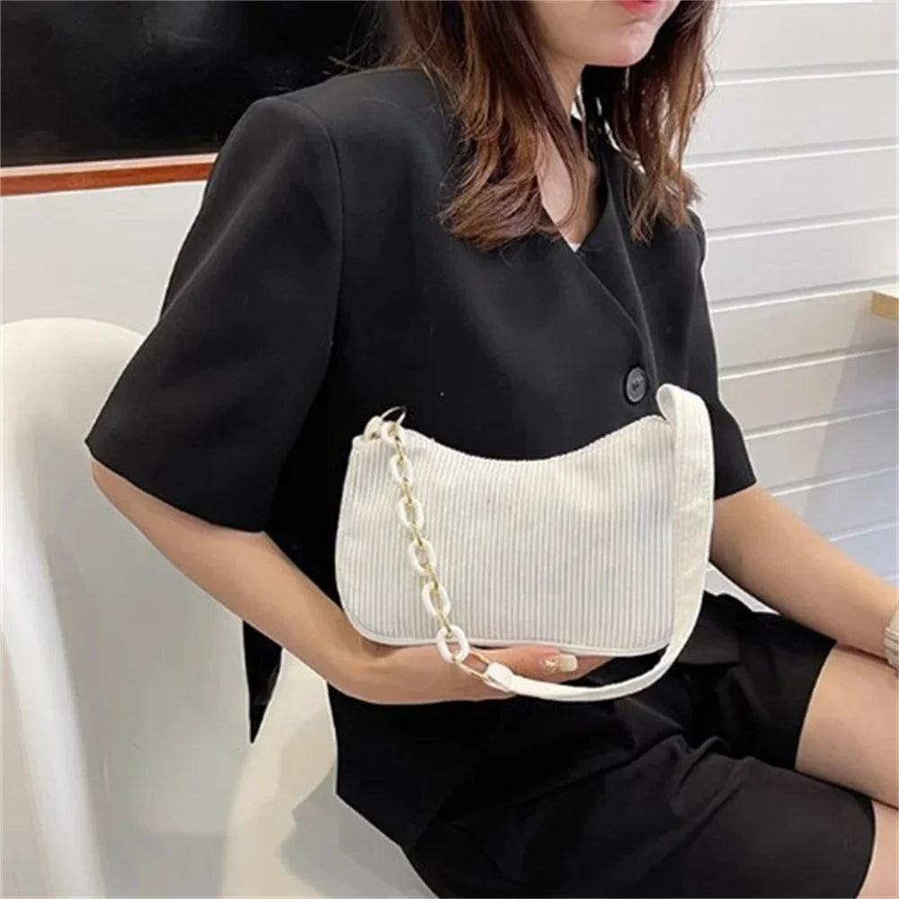 Mini Fashion Women's Shoulder Bag Felt Solid Color Retro Underarm BagsSPECIFICATIONSBrand Name: NoEnName_NullHign-concerned Chemical: NoneHandbags Type: Shoulder BagsMain Material: CorduroyLining Material: COTTONShape: BoxPlace Of OrigDMEwomenstorenull