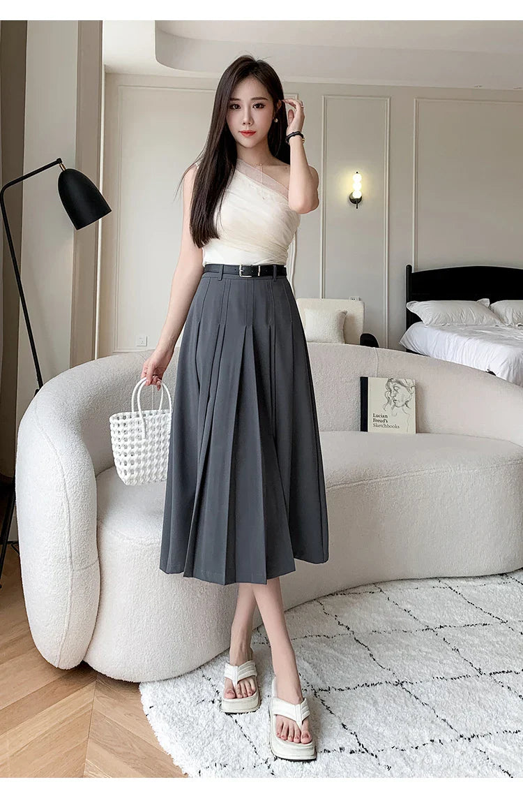 High Waist Midi Pleated Skirts Women's Fashion A-line Casual Suit SkirSPECIFICATIONSBrand Name: YUAZHOQIMaterial: POLYESTERStyle: CasualElasticity: Non StrechOrigin: Mainland ChinaCN: GuangdongSeason: Spring/SummerFabric Type: BroadcloDMEwomenstorenull