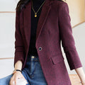 Elegant long-sleeve women's blazer with turn-down collar and single-button closure