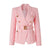 Luxury pink women's double-breasted blazer with notched collar and pockets.