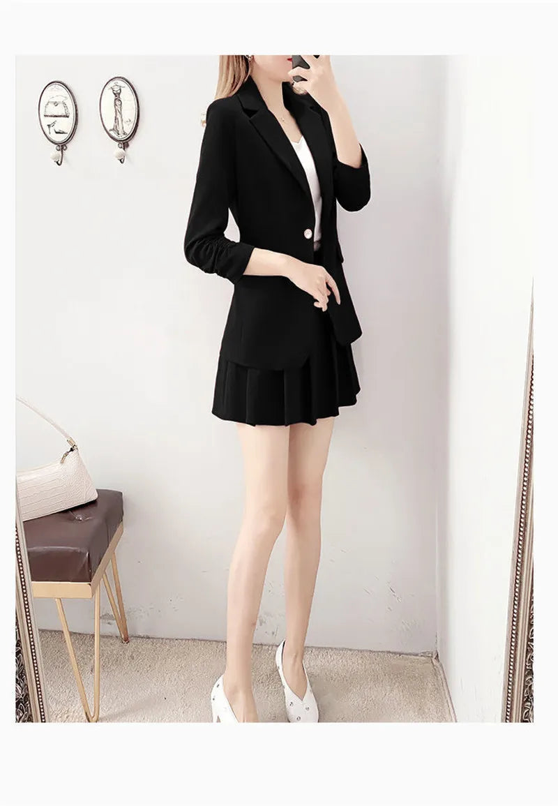 Elegant two-piece black blazer jacket and A-line skirt suit for women.