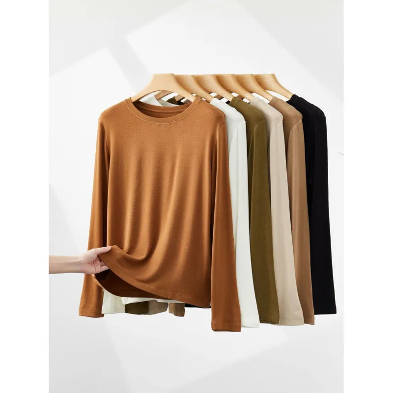 Wool Soft Long Sleeve T-shirts Women Round Neck Slim Fit Basic HeatingSPECIFICATIONSBrand Name: Y DemoStyle: Office LadyAge: MIDDLE AGEOrigin: Mainland ChinaCN: ZhejiangSeason: Autumn/WinterClothing Length: regularDecoration: noneElastDMEwomenstorenull