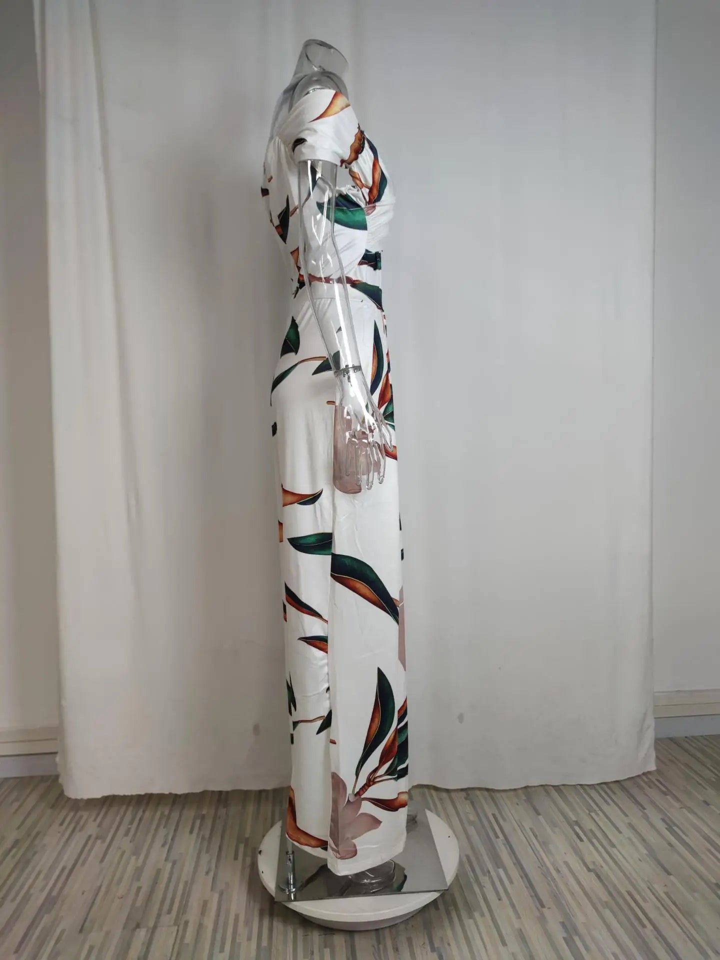 Fashion Printed Casual High Waist Jumpsuit Ladies Sexy Off Shoulder FlSPECIFICATIONSBrand Name: NoEnName_NullStyle: StreetwearAge: MIDDLE AGECraft of Weaving: TATOrigin: Mainland ChinaCN: GuangdongSeason: SummerMaterial: POLYESTERMaterDMEwomenstorenull