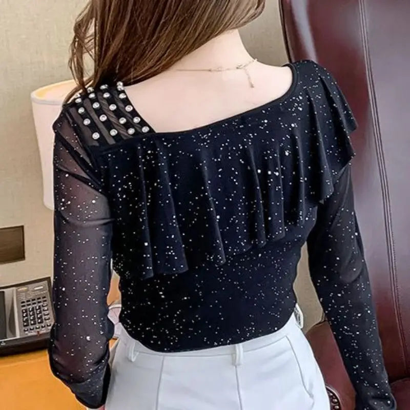 Sweet Skew Collar Spliced Gauze Ruffles Beading Blouse Female ClothingSPECIFICATIONSBrand Name: COZOKStyle: SweetElasticity: Slight StrechOrigin: Mainland ChinaSeason: Spring/SummerFabric Type: blendedMaterial: POLYESTERPattern Type: SDMEwomenstorenull