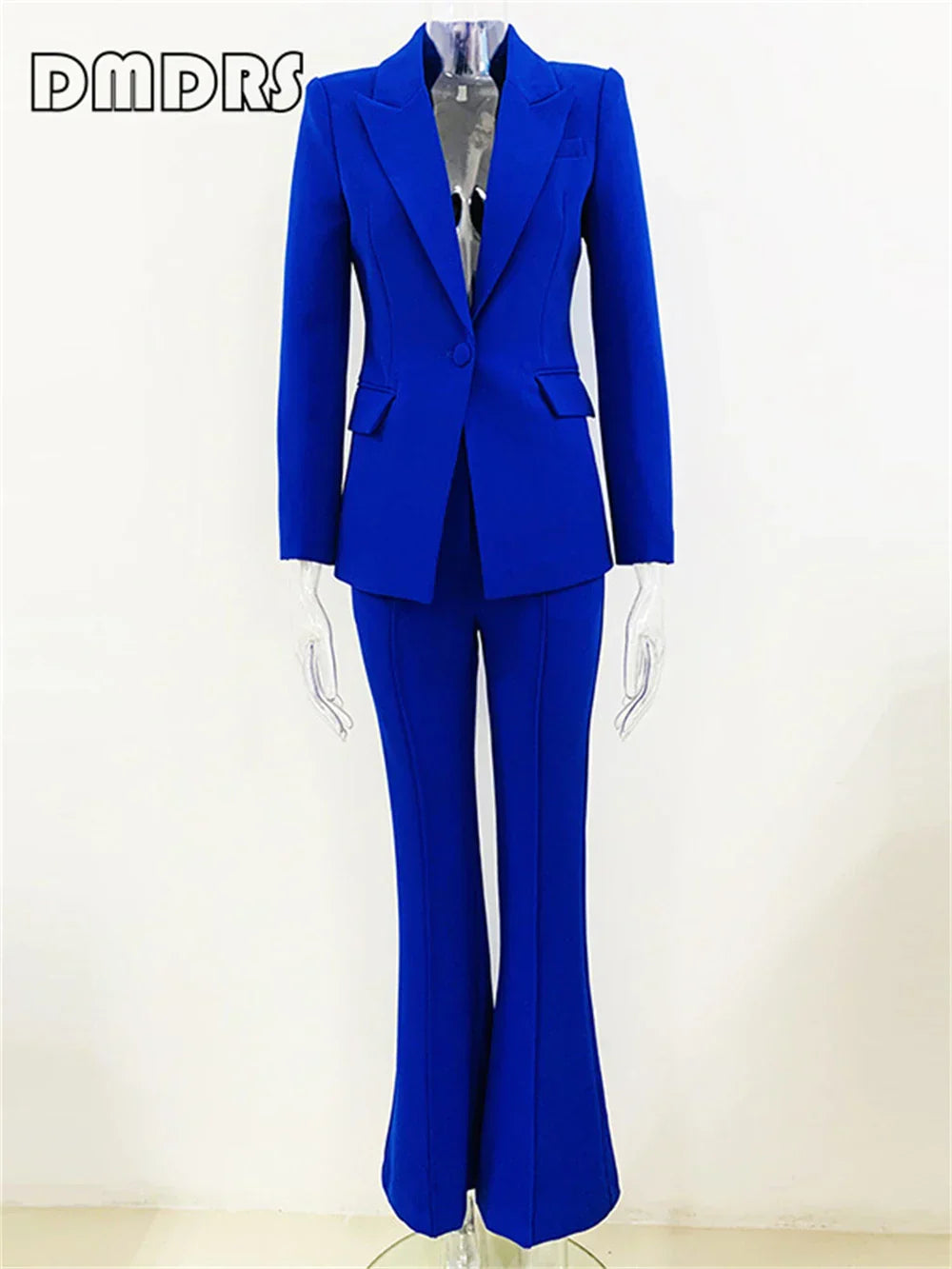 Gradient green slim fitting two-piece suit for women with blazer and flare pants, formal style.