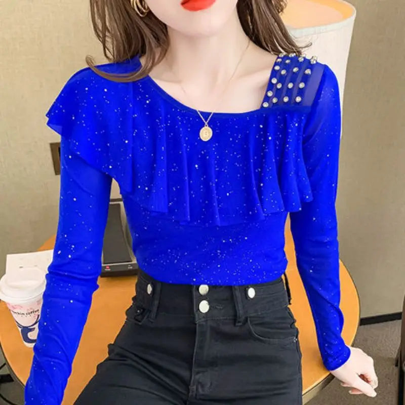 Sweet Skew Collar Spliced Gauze Ruffles Beading Blouse Female ClothingSPECIFICATIONSBrand Name: COZOKStyle: SweetElasticity: Slight StrechOrigin: Mainland ChinaSeason: Spring/SummerFabric Type: blendedMaterial: POLYESTERPattern Type: SDMEwomenstorenull