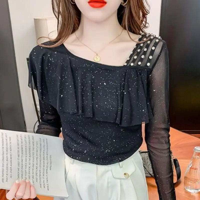 Sweet Skew Collar Spliced Gauze Ruffles Beading Blouse Female ClothingSPECIFICATIONSBrand Name: COZOKStyle: SweetElasticity: Slight StrechOrigin: Mainland ChinaSeason: Spring/SummerFabric Type: blendedMaterial: POLYESTERPattern Type: SDMEwomenstorenull