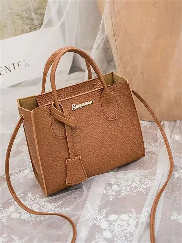 Ladies Handbags Single-shoulder Crossbody Handheld Triple-use Satchel SPECIFICATIONSBrand Name: NoEnName_NullOrigin: Mainland ChinaCN: GuangdongLining Material: POLYESTERMain Material: PUPlace Of Origin: GUANG DONG ProvincePlace Of OriDMEwomenstorenull