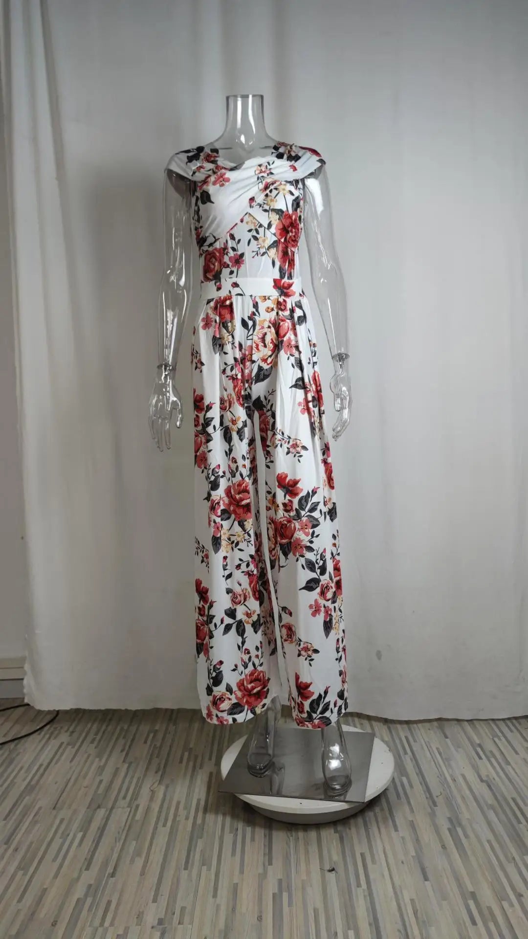 Fashion Printed Casual High Waist Jumpsuit Ladies Sexy Off Shoulder FlSPECIFICATIONSBrand Name: NoEnName_NullStyle: StreetwearAge: MIDDLE AGECraft of Weaving: TATOrigin: Mainland ChinaCN: GuangdongSeason: SummerMaterial: POLYESTERMaterDMEwomenstorenull