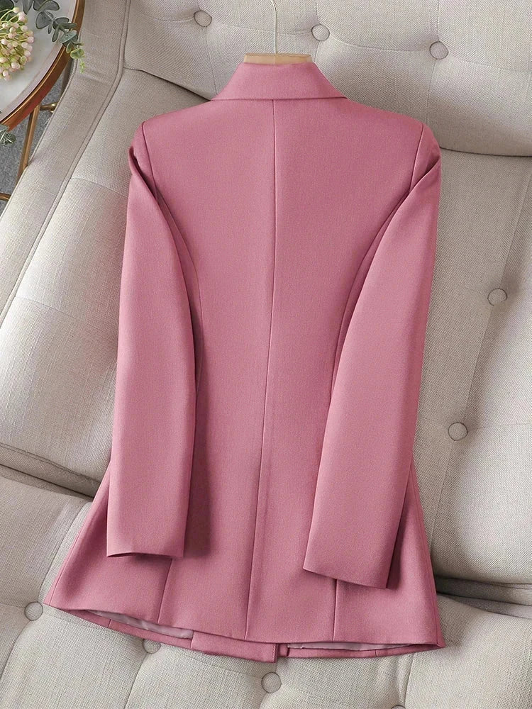 Long sleeve pink blazer for women with triple-breasted closure, ideal for casual wear.